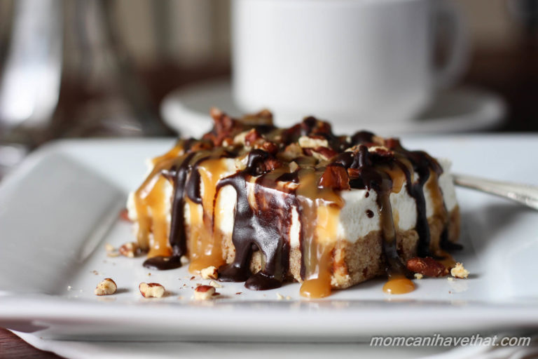 Pecan Turtle Cheesecake Bars have a brown sugar pecan crust & light-textured vanilla cheesecake topped with toasted pecans, chocolate fudge, & caramel. No-bake, low carb & sugar free | lowcarbmaven.com