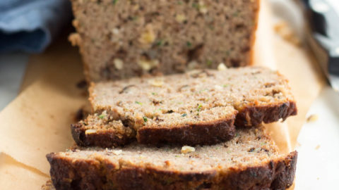Sliced Low Carb Zucchini Bread on a cutting board.